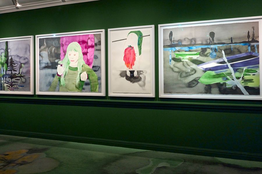 This is an image of four beautiful images on a wall, each conveying a different message about love. There is a dark green and pink theme.