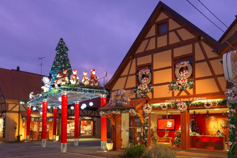 This is an image with a Christmas village full of lights.