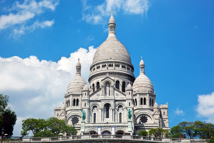 This is an image of the Sacre-Coeur Cathedral in Paris atop the hill.