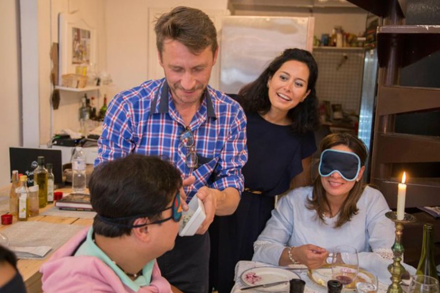 This is an image of a tour group that has been blindfolded, so the tour guide can feed them cheese for them to guess.