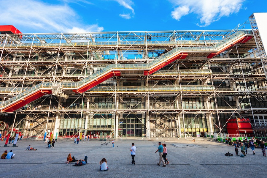 This is an image of the front of a quirky industrialist looking museum with steel railings running throughout it.