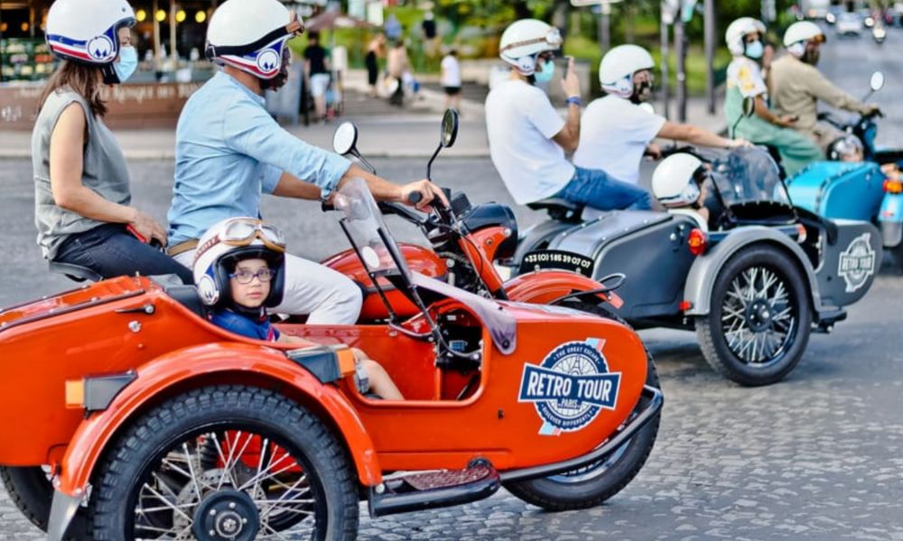 This is an image of a group of people in bikes with side cars.