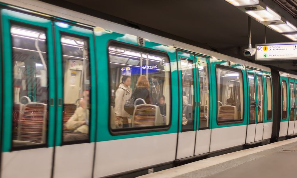 This is an image of a metro train in Paris pulling into the station.