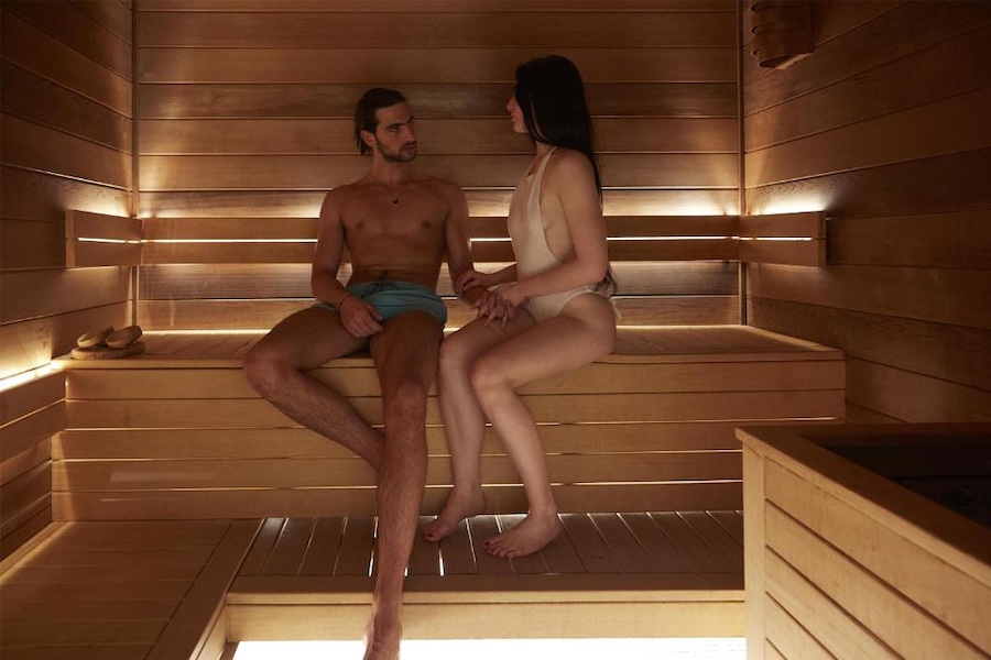 Picture shows a couple in the sauna room.