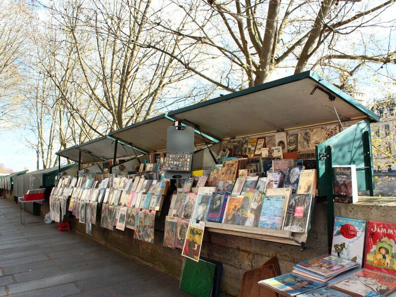 This is an image of the bookstores and stalls that pop up on the edge of the Seine in summer.