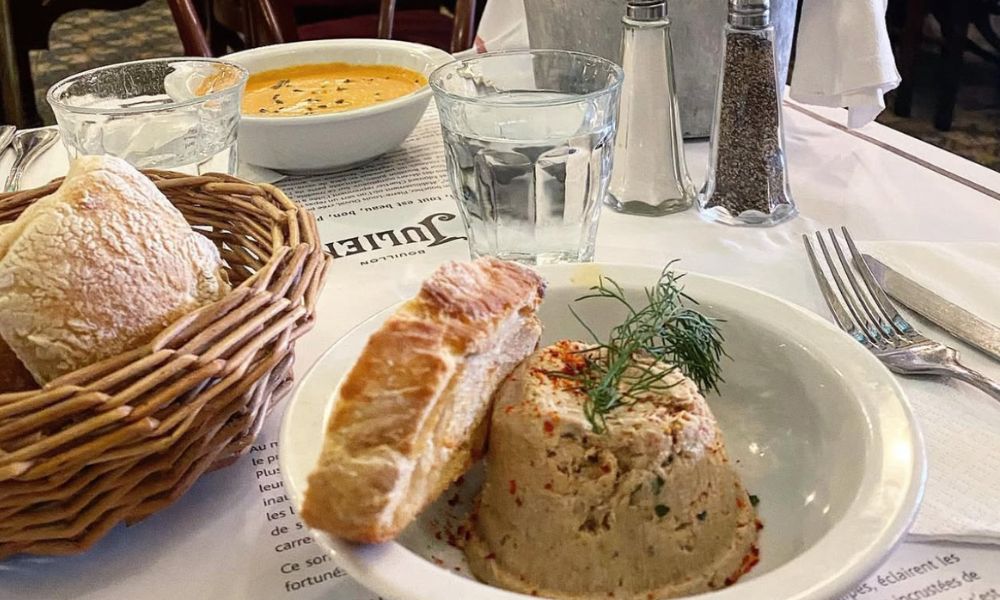 This is an image of a pate-like dish with bread.