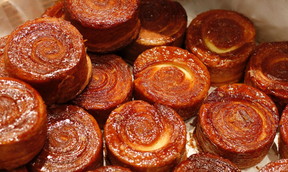 This is an image of a sticky, delicious circular pastry.