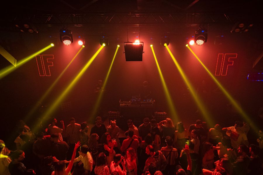 This is an image of a bird's eye view of a club with strobe lights and more.