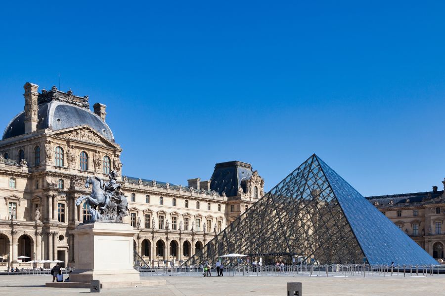 This is an image of the Louvre from the outside. No people are lining up outside yet.