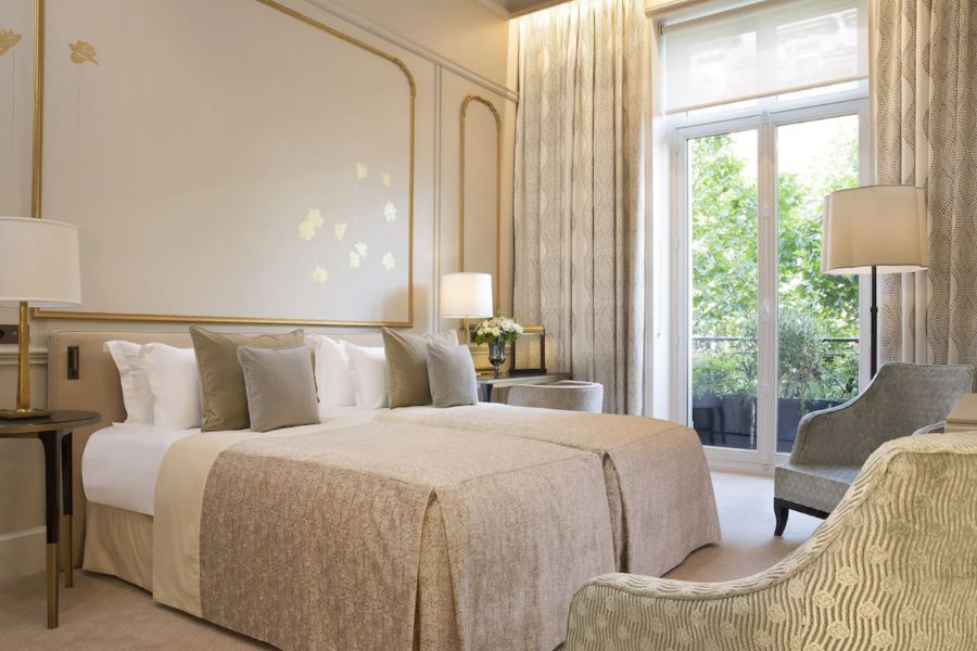 This is an image of a fancy hotel room in Paris.