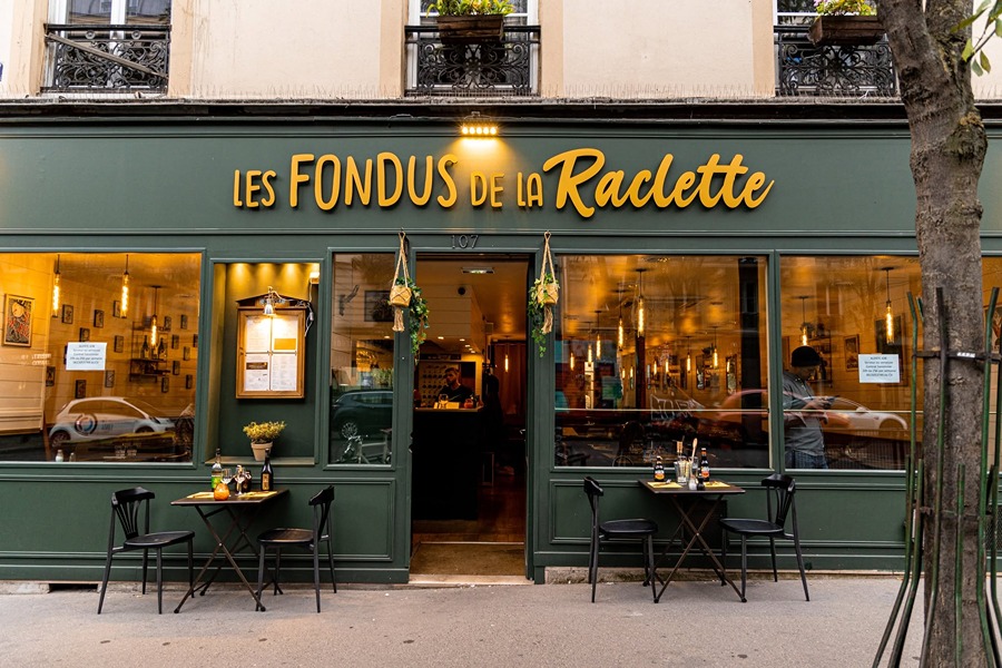 Exterior of Les Fondus de la Raclette, one of the family-friendly places to eat with kids in Paris.