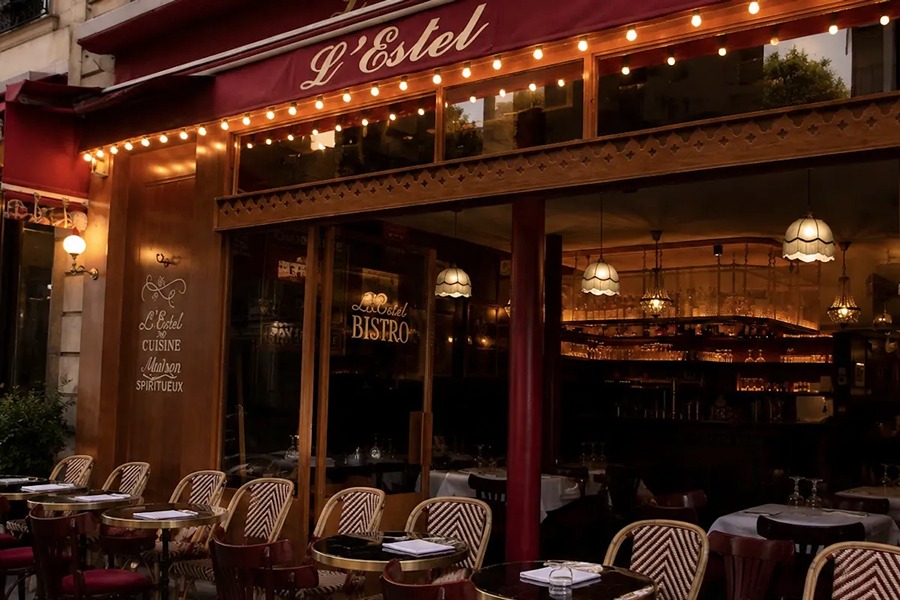 Exterior and outdoor terrace of L’Estel, one of the family-friendly places to eat with kids in Paris.