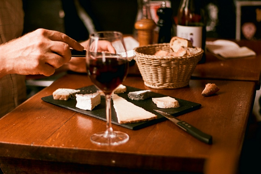 Glasses of red Beaujolais Nouveau wine on a table at a Paris café