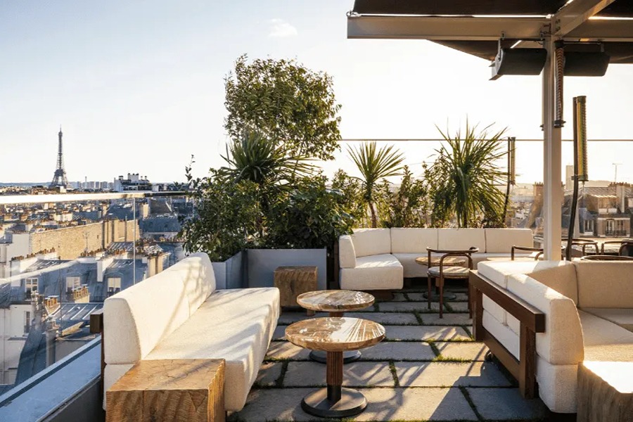 Rooftop terrace at the Fondation Hotel with Eiffel Tower views, one of the best rooftop bars and things to do in September in Paris.