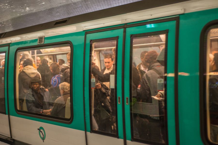 This is an image of a packed Paris metro train at peak hour.
