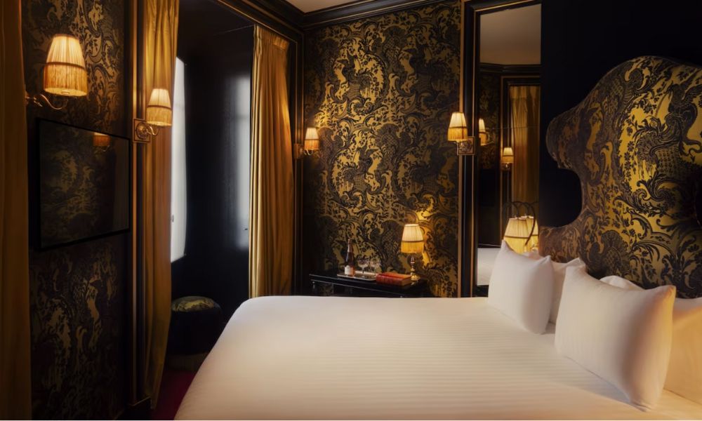 This is an image of a very dark room with grungy decor and lots of gold.