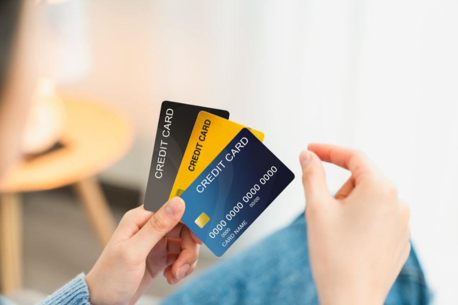 This is an image of someone fanning out a bunch of credit cards.