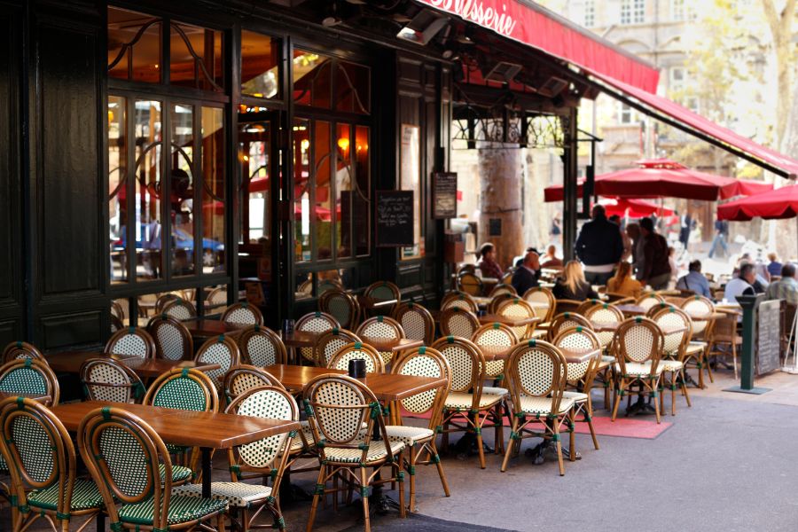 This is an image of a bistro's outside seating in Paris.