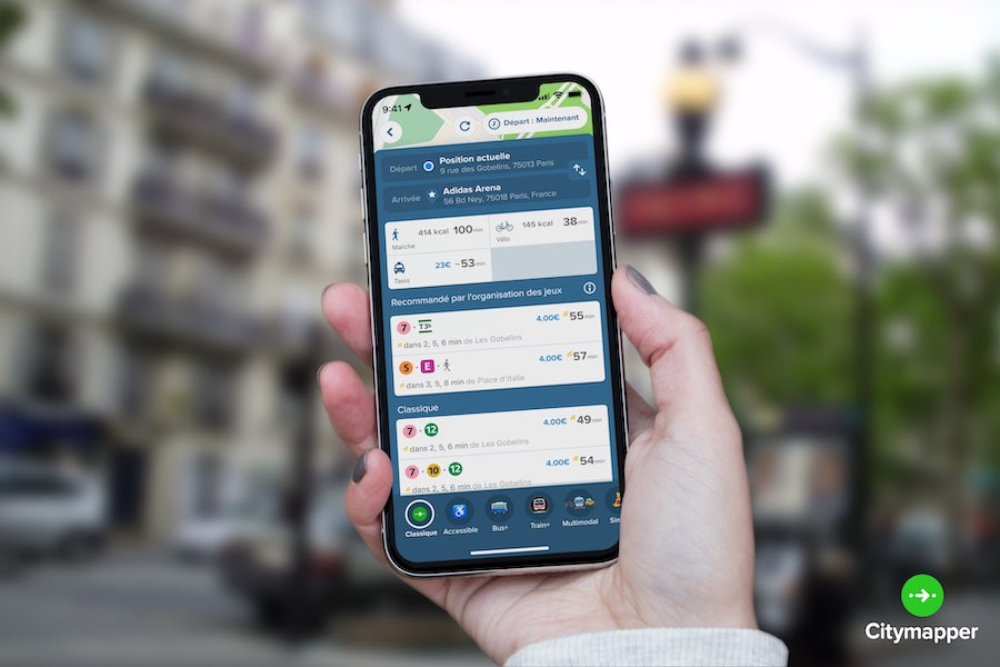 This is an image of someone holding up their phone, which is open to the CityMapper app that allows you to easily get around the city.